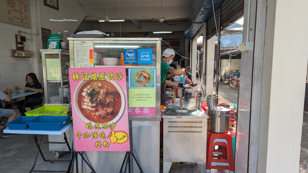 Lim Ji now operates out of a ‘kopitiam’ next to the house where they started in Bercham — Picture by Ethan Lau