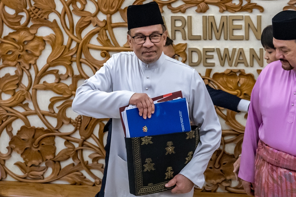 Prime Minister Datuk Seri Anwar Ibrahim arrives at the Parliament to table Budget 2025 on October 18, 2024. — Picture by Firdaus Latif