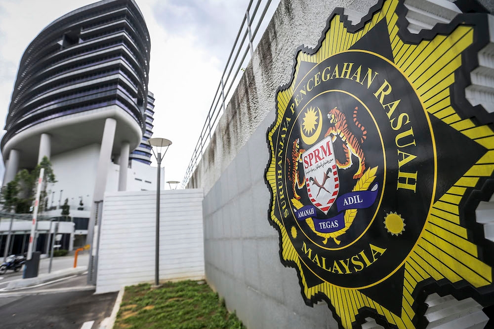 Following an application by MACC here today, Magistrate Irza Zulaikha Rohanuddin issued a four-day remand order on the three individuals, aged between their 40s and 50s. — Picture by Hari Anggara
