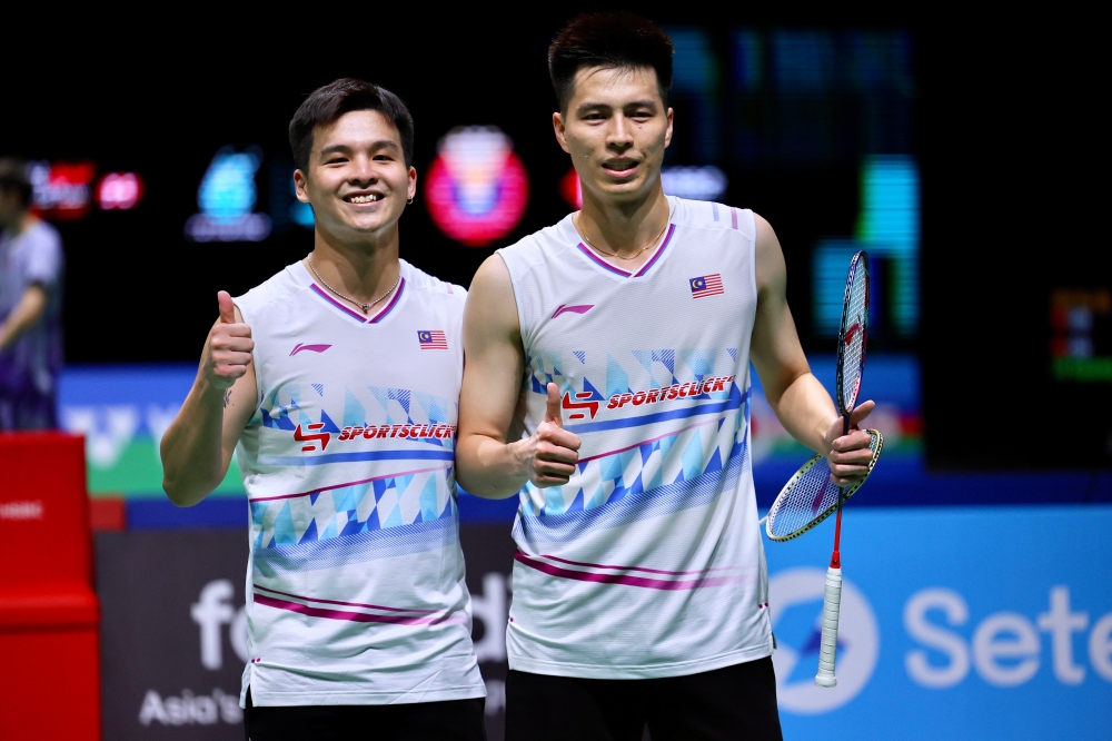 Teo Ee Yi and Ong Yew Sin celebrate their hard-fought 23-21, 16-21, 21-18 win against South Korea’s Jin Yong and Kang Min Hyuk in their Round of 16 match at the 2025 Malaysia Open at the Axiata Arena in Bukit Jalil, Kuala Lumpur January 9, 2025. — Bernama pic