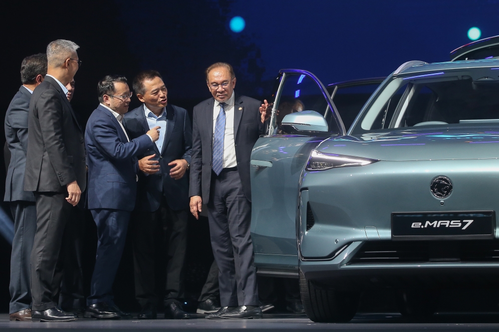 Prime Minister Datuk Seri Anwar Ibrahim during the launch of the Proton e.MAS 7 at Mitec in Kuala Lumpur December 16, 2024. — Picture by Yusof Mat Isa