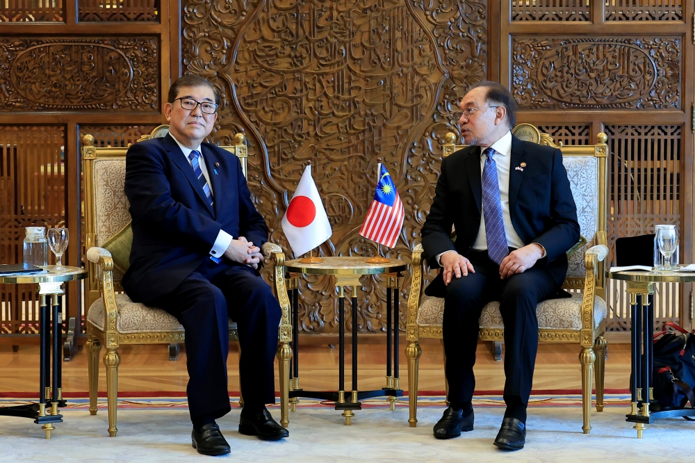 Prime Minister Datuk Seri Anwar Ibrahim and Japan Prime Minister Shigeru Ishiba before their bilateral talks in Putrajaya January 10, 2025. — Bernama pic