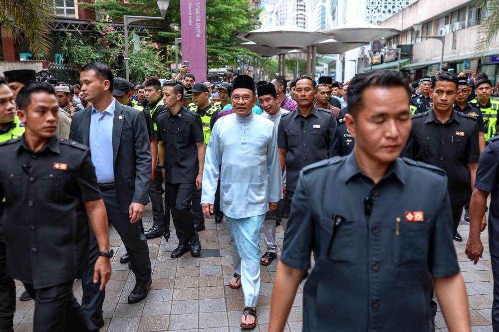 Prime Minister Datuk Seri Anwar Ibrahim conducts a walkabout after Friday prayers at Jalan Masjid India in Kuala Lumpur January 10, 2025. — Bernama pic