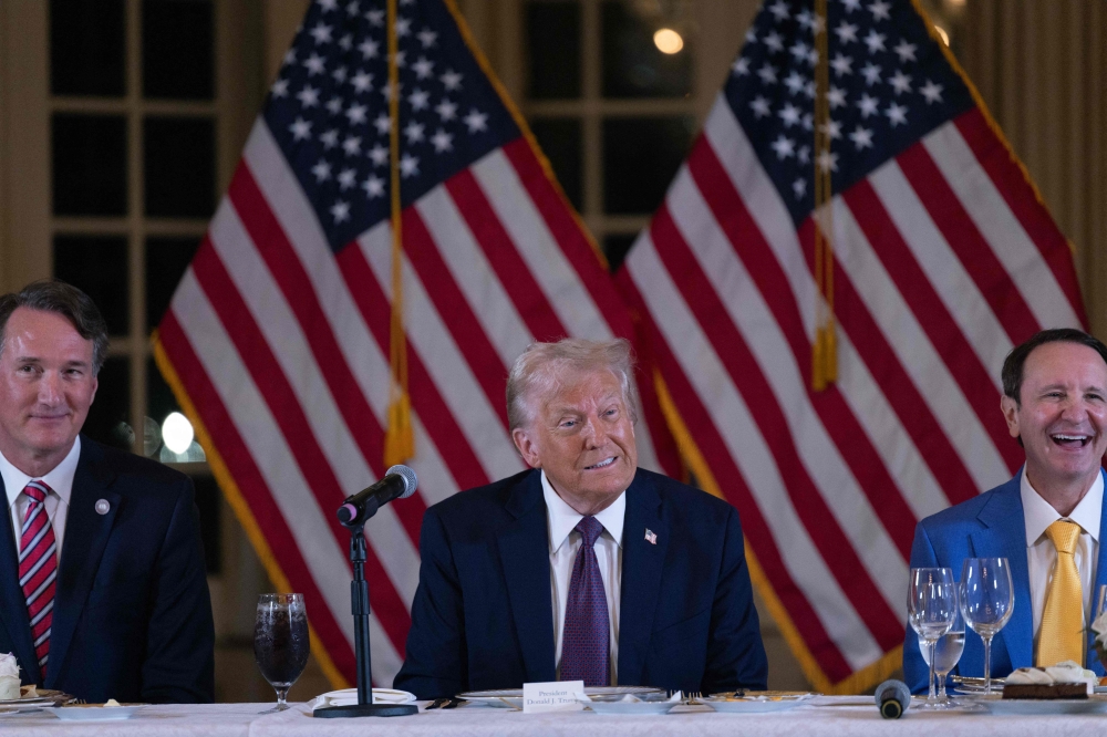 US President-elect Donald Trump (centre) speaks during a meeting with Republican governors at the Mar-a-Lago Club on January 09, 2025 in Palm Beach, Florida. — AFP pic