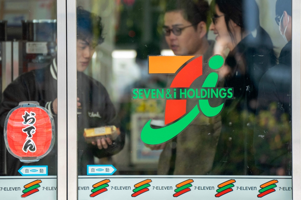 Shares in 7-Eleven’s parent rose more than seven per cent on Friday after a report that US investment firm Apollo is eyeing a US$9.5 billion (RM42.7 billion) stake in the owner of the world’s biggest convenience store chain. — AFP pic