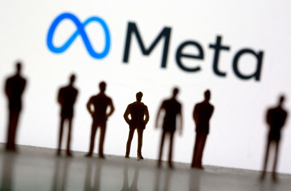 Small toy figures are seen in front of Meta's logo in this illustration taken, October 28, 2021. — Reuters pic