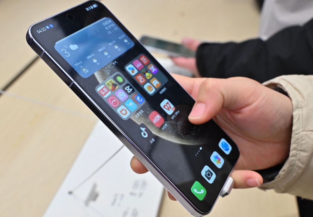 In some cases, victims were guided to disable Google Play Protect, leaving them vulnerable to further malware. — AFP pic