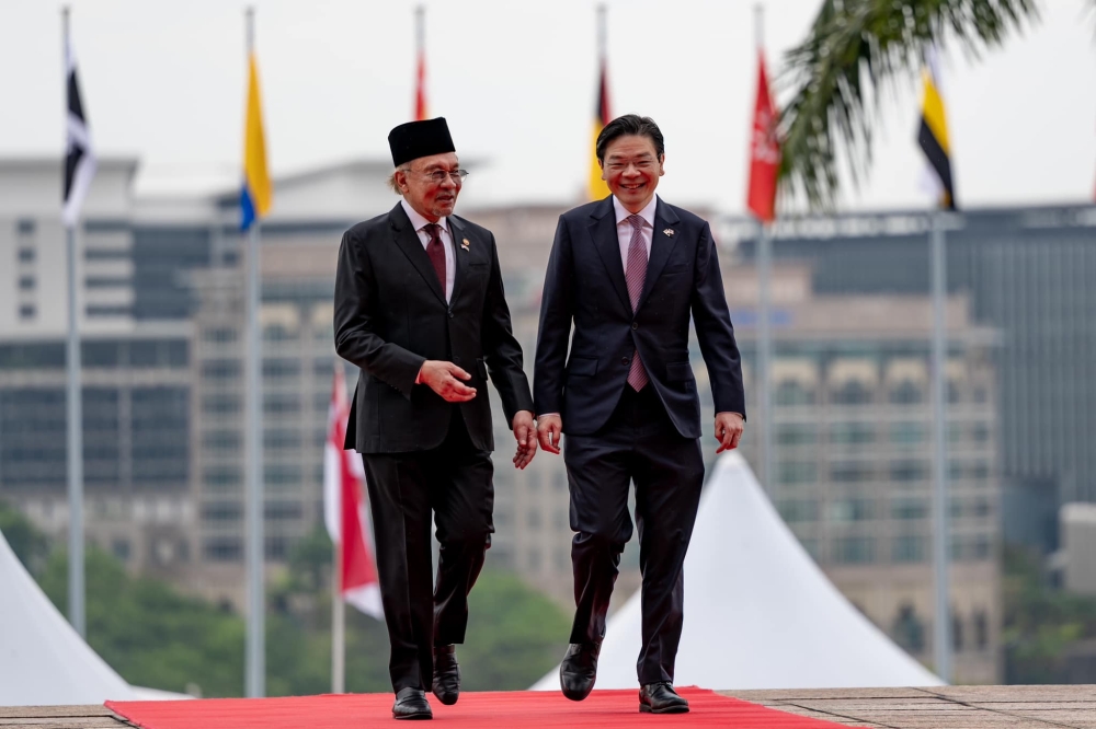 Prime Minister Datuk Seri Anwar Ibrahim said the visits of three foreign leaders to Malaysia, namely Singaporean Prime Minister Lawrence Wong (pic), Indonesian President Prabowo Subianto and Japanese Prime Minister Shigeru Ishiba this week are meaningful for the country towards a new chapter of cooperation. — Picture via Facebook/Anwar Ibrahim 