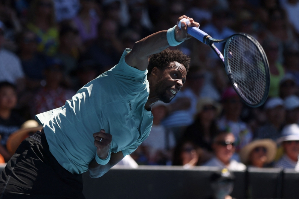 Gael Monfils of France serves to Zizou Berges of Belgium during their men’s singles final match at the ATP Auckland Classic tennis tournament in Auckland on January 11, 2025. — AFP pic