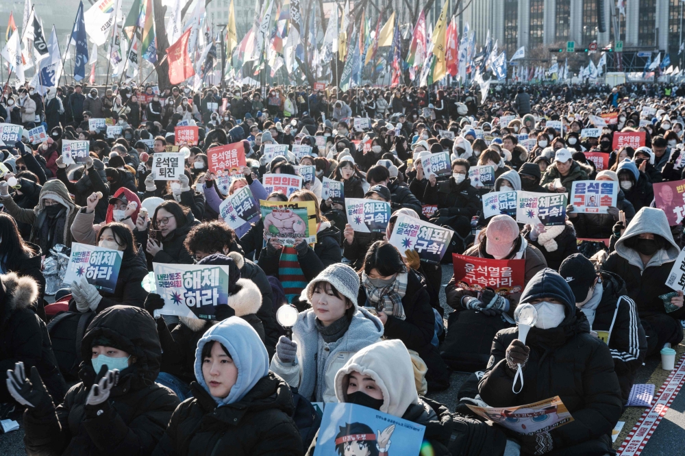 Protesters at a rally against impeached South Korean President Yoon Suk Yeol. — AFP