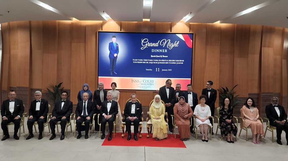 Tun Pehin Sri Wan Junaidi Tuanku Jaafar (seated, 6th left), his wife Toh Puan Datuk Patinggi Fauziah Mohd Sanusi (seated, 6th right) and Deputy Prime Minister Datuk Seri Fadillah Yusof (seated, 5th left) are seen in a photo call with other distinguished guests. — The Borneo Post pic 