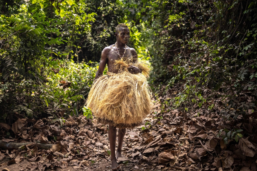 A Kokou initiate, a warrior god in the traditional religion of Benin, walks in the sacred forest in Ouidah, on January 9, 2025 during the first day of the Voodoo Festival. — AFP pic