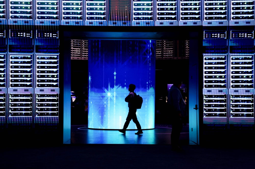 Attendees walk through the SK Group booth during the Consumer Electronics Show (CES) in Las Vegas, Nevada on January 10, 2025. — AFP pic