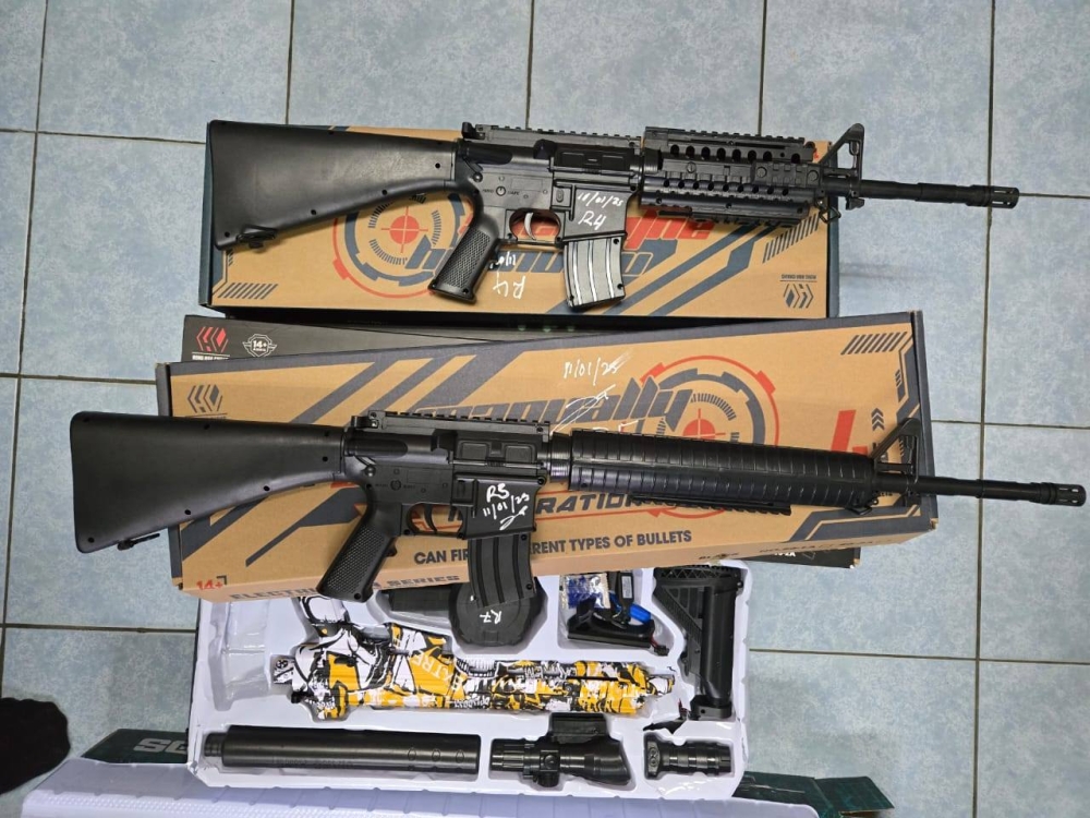Some of the fake firearms that were seized by police. — Picture via Facebook