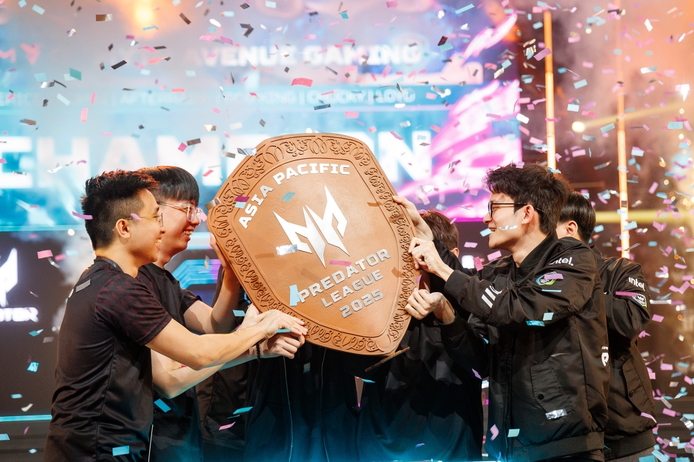 Local Dota 2 team Myth Avenue Gaming (MAG) lifting the coveted Predator Shield at the APAC Predator League 2025 Grand Finals.—Picture by Firdaus Latif