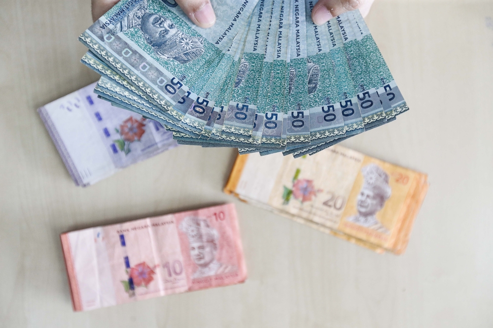 The ringgit opened at 4.5100/5185 against the US dollar. — Picture by Sayuti Zainudin