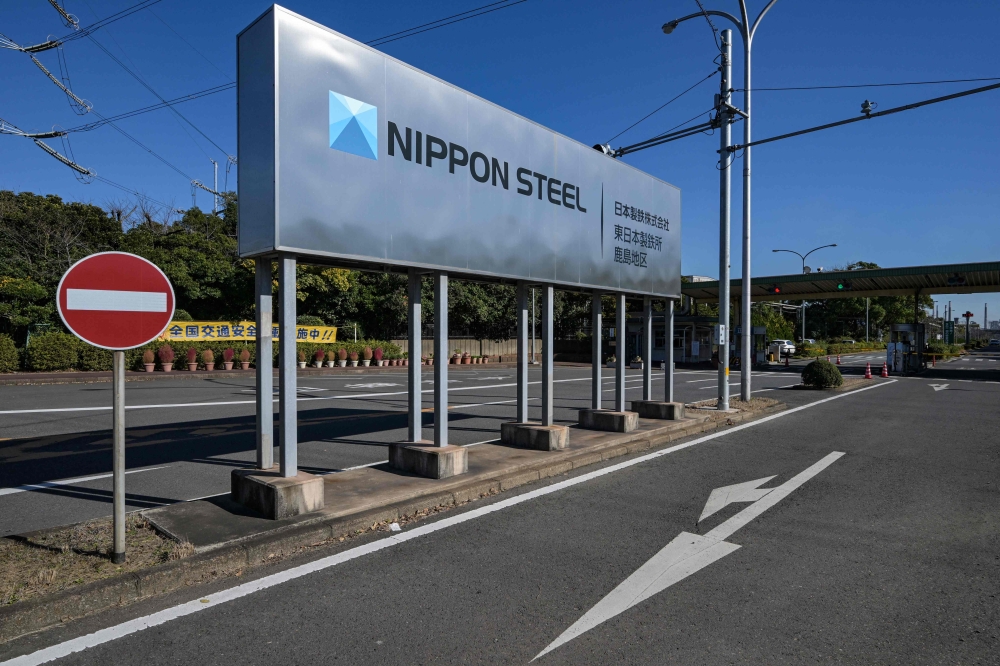 An entrance sign for Japanese company Nippon Steel's East Nippon Works Kashima Area facility is pictured in Kashima, Ibaraki prefecture, north of Tokyo on December 6, 2024. — AFP pic