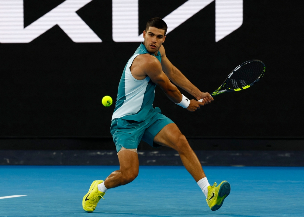 Spain’s Carlos Alcaraz in action during his first round match against Kazakhstan’s Alexander Shevchenko at Melbourne Park, January 13, 2025. — Reuters pic