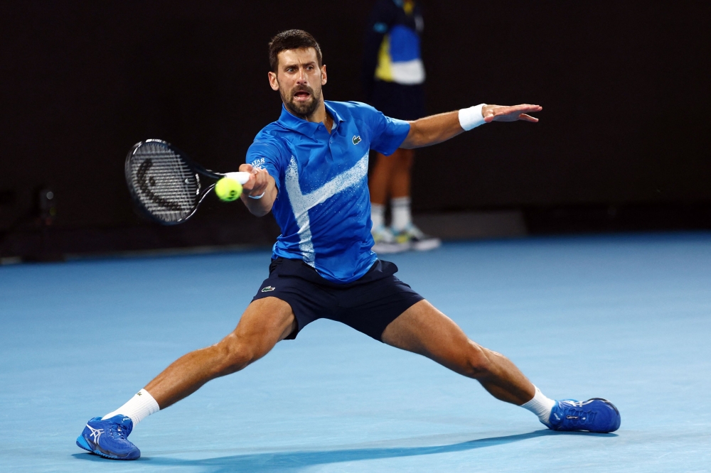 Serbia’s Novak Djokovic in action during his first round match against Nishesh Basavareddy of the United States at Melbourne Park, January 13, 2025. — Reuters pic 