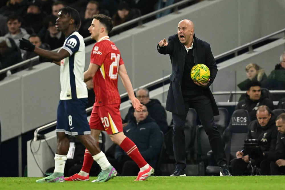Liverpool’s Dutch manager Arne Slot shouts instructions to the players from the touchline during the English League Cup semi-final first leg football match between Tottenham Hotspur and Liverpool at the Tottenham Hotspur Stadium in London, on January 8, 2025. — AFP pic 