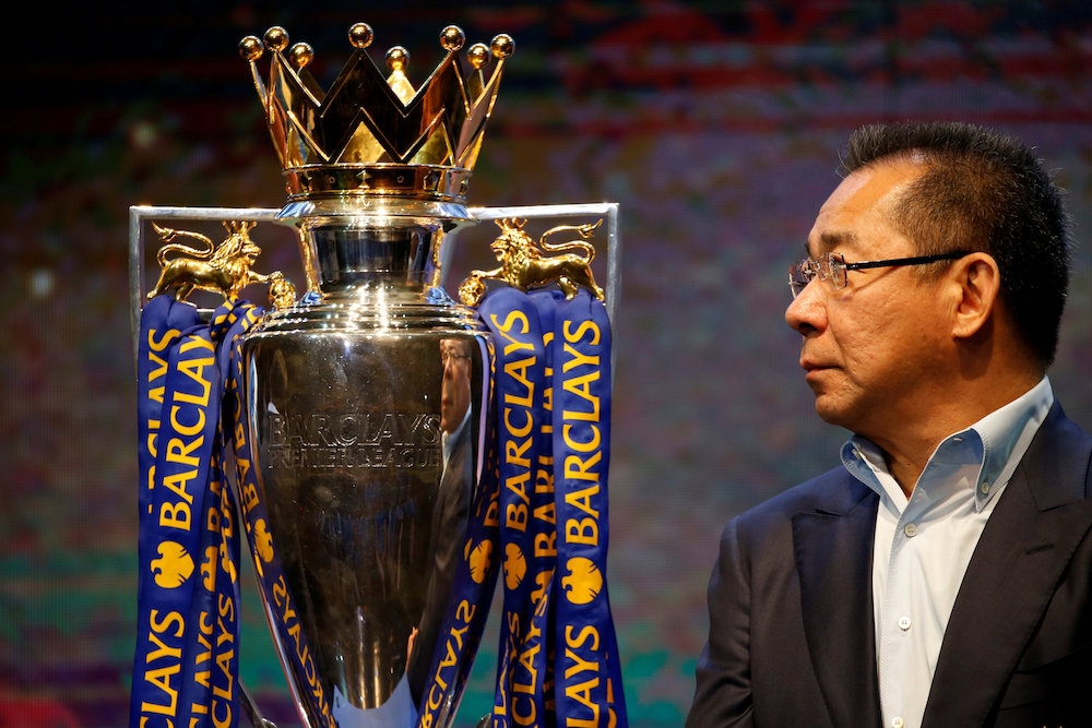 Vichai Srivaddhanaprabha, the late owner of football club Leicester City next to the club’s English Premier League trophy in Bangkok May 18, 2016. — Reuters