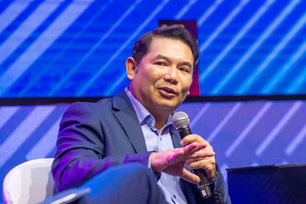 Economy Minister Rafizi Ramli delivers his speech during the KL Summit 20 at the Kuala Lumpur Convention Centre on 22 April 2024. — Picture by Shafwan Zaidon
