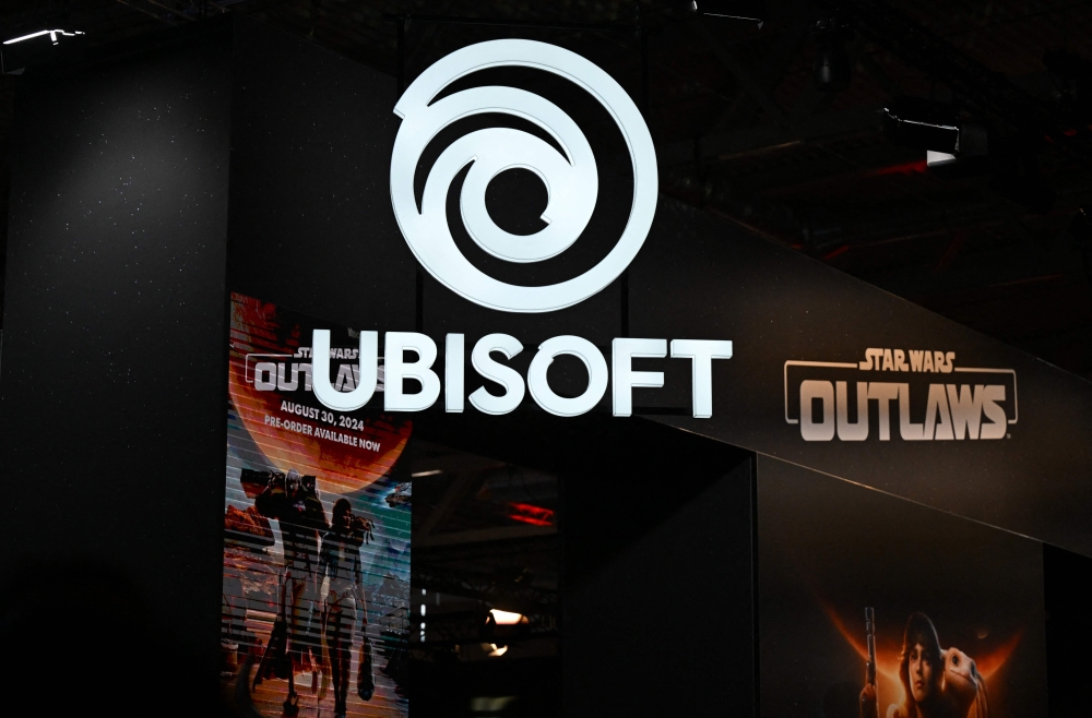 A photo shows the Ubisoft logo at the Gamescom video games trade fair in Cologne, western Germany on August 22, 2024. — Ubisoft