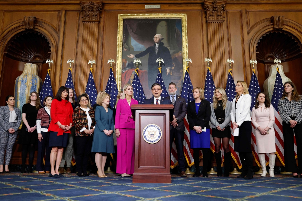 US Speaker of the House Mike Johnson (R-LA) (centre) speaks at a news conference following the House of Representatives vote on HR 28 — ‘Protection of Women and Girls in Sports Act’ at the US Capitol in Washington January 14, 2025. — AFP pic