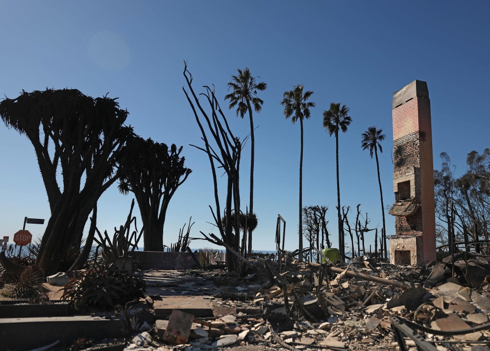 A chimney remains at the site of a home that was destroyed by the Palisades Fire in Pacific Palisades, California, January 14, 2025. — AFP pic