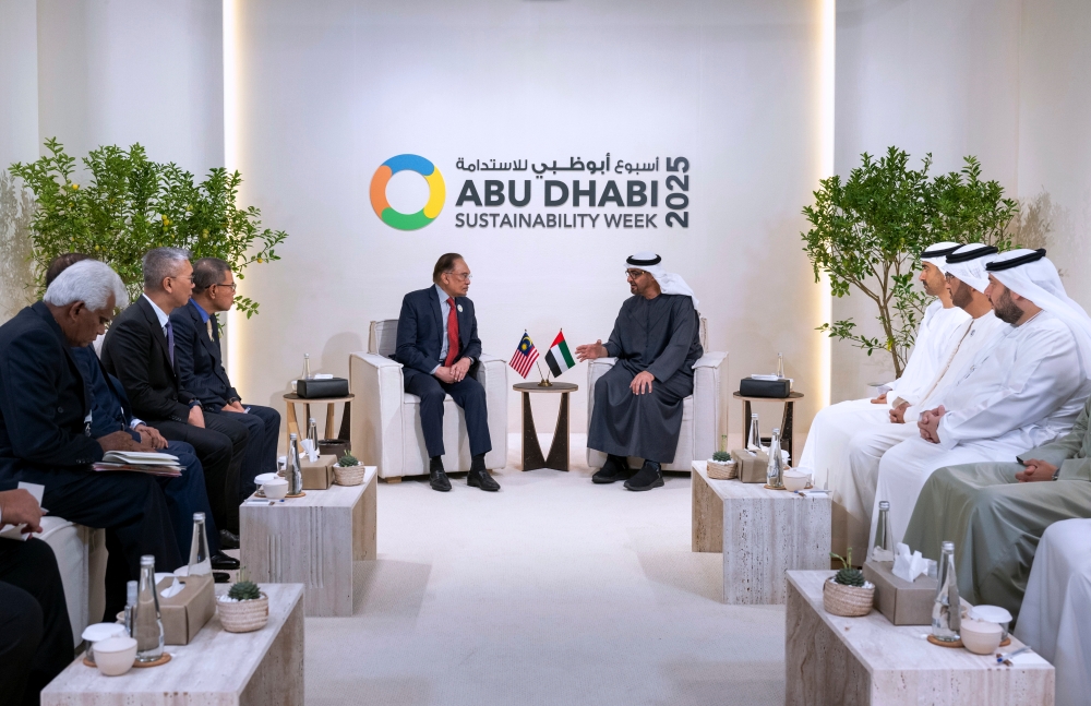 Prime Minister Datuk Seri Anwar Ibrahim (fourth from left) pays a courtesy call on United Arab Emirates President and Abu Dhabi Ruler Sheikh Mohamed bin Zayed Al Nahyan during the Abu Dhabi Sustainability Week 2025 at the Abu Dhabi National Exhibition Centre on January 14, 2025. — Bernama pic