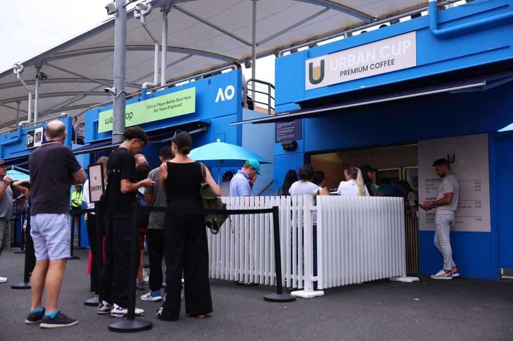 Long queues face fans looking to indulge their passion for the city’s favourite beverage at the 15 coffee stores Tennis Australia says dot the 40-hectare site. — Reuters pic