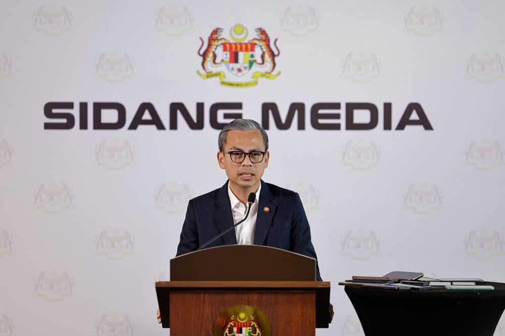 Government spokesman Fahmi Fadzil conducts a press conference in Putrajaya on Jan 15, 2025. — Bernama pic