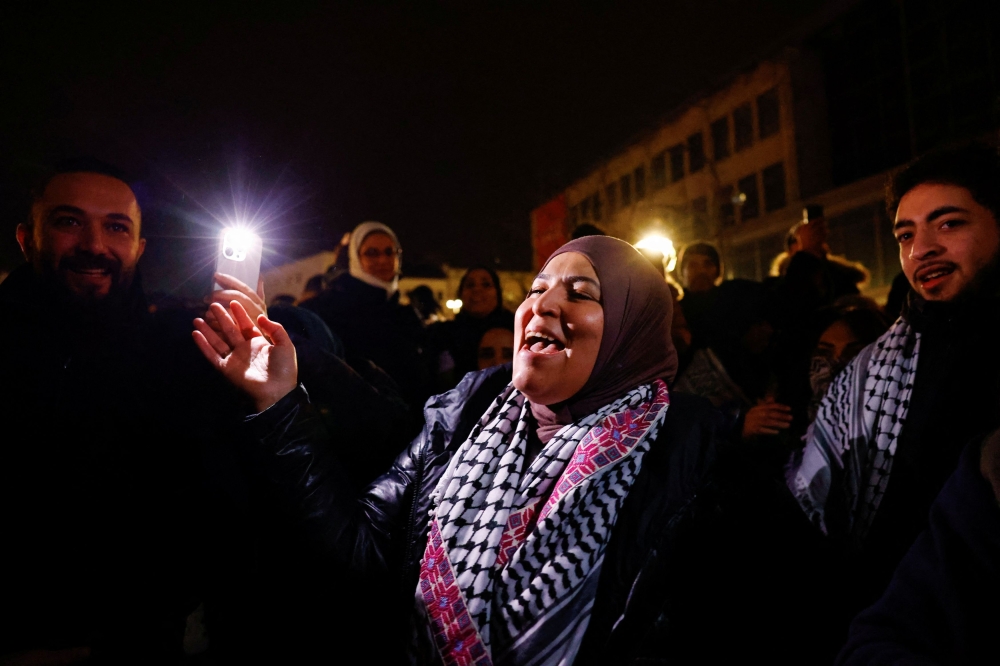 Palestinian supporters celebrate news of a ceasefire with Israel in Berlin January 15, 2025. — Reuters pic