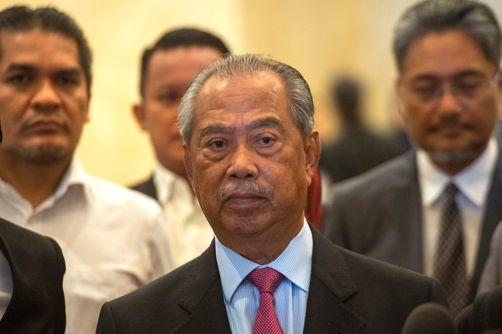 A file photographs shows former prime minster, Tan Sri Muhyiddin Yassin leaving the Palace of Justice in Putrajaya on February 28, 2024. — Picture by Shafwan Zaidon