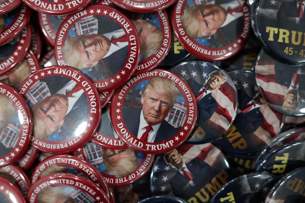 Donald Trump pins are displayed for sale at I Love DC Gifts ahead of the Inauguration in Washington January 16, 2025. — AFP pic
