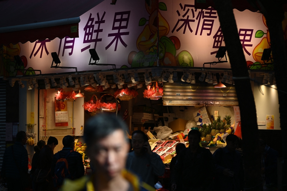 China’s economy grew slightly quicker than expected last year but analysts surveyed by AFP warned it could fall to just 4.4 per cent this year and even drop below 5 per cent in 2026. — AFP pic