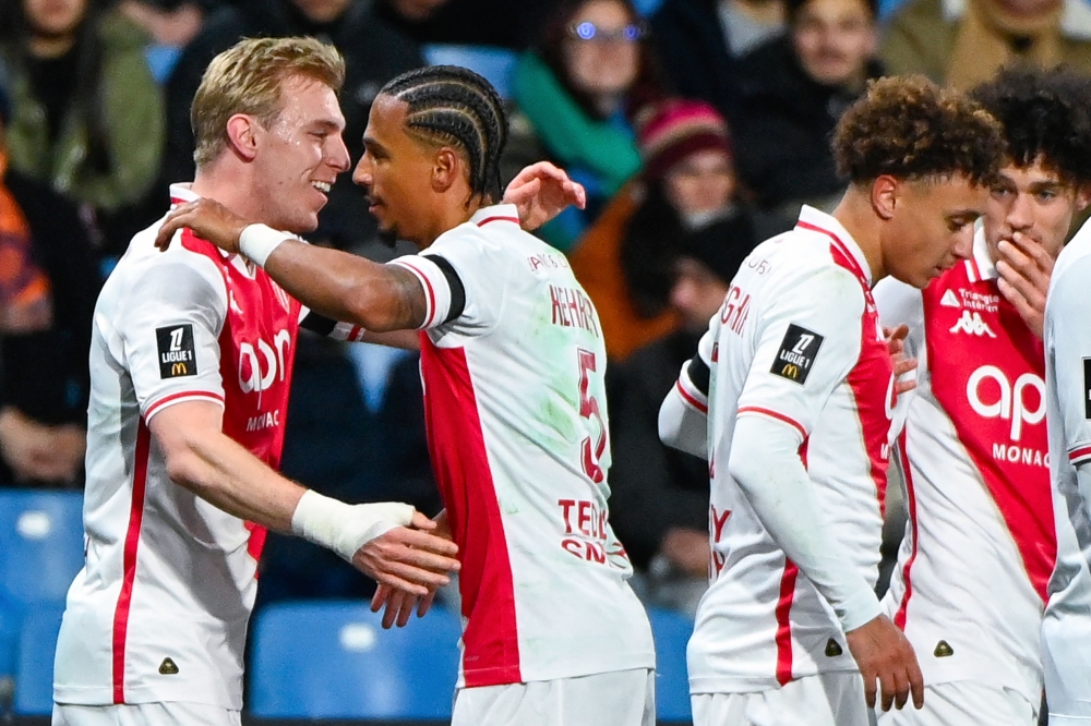 Monaco’s Thilo Kehrer (centre) congratulated by Mika Biereth (left) after scoring his team's first goal against Montpellier Herault SC at Stade de la Mosson in Montpellier, —  Picture from AFP