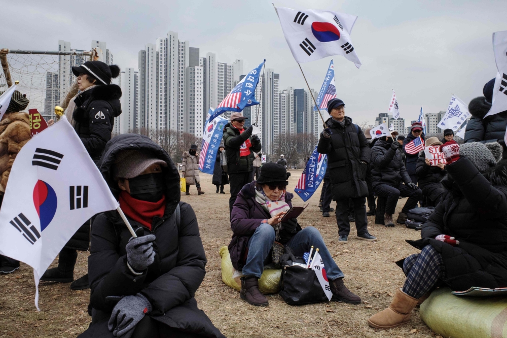 Supporters of impeached South Korean president Yoon Suk Yeol gather for a rally outside the government complex building housing the Corruption Investigation Office for High-ranking Officials (CIO) in Gwacheon. — Picture from AFP