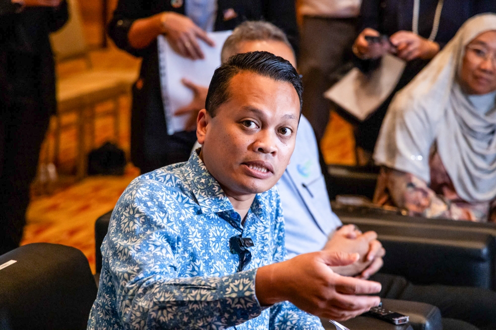 Minister of Natural Resources and Environmental Sustainability Nik Nazmi Nik Ahmad said  Malaysia has emphasised the importance of a sustainable mineral industry framework and the need for the world to address geopolitical tensions during the ministerial roundtable session at the Future Minerals Forum 2025. — Picture by Firdaus Latif