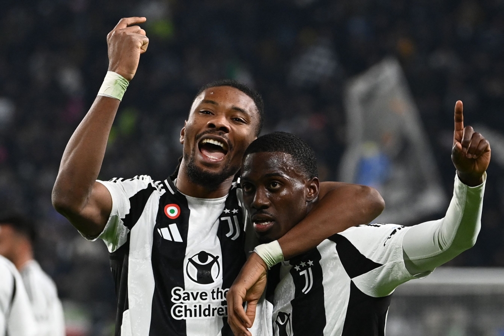 Juventus’ American Tim Weah (right) celebrates his team’s second goal with Khephren Thuram-Ulien. — Picture from AFP
