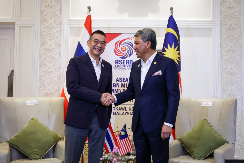 Foreign Minister Datuk Seri Mohamad Hasan (right) held a bilateral meeting with Thailand's Foreign Minister Maris Sangiampongsa in conjunction with the ASEAN Foreign Ministers’ Retreat (AMM) at the Langkawi International Convention Centre (LICC) yesterday. — Bernama