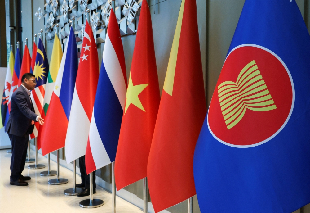 The Asean flag is placed alongside the flags of its member countries ahead of the Asean Foreign Ministers’ Retreat in Langkawi January 17, 2025. — Reuters pic  