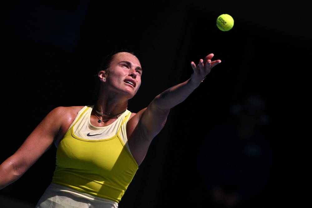 Belarus’ Aryna Sabalenka serves against Russia’s Mirra Andreeva during their women’s singles match on day eight of the Australian Open in Melbourne January 19, 2025. — AFP pic