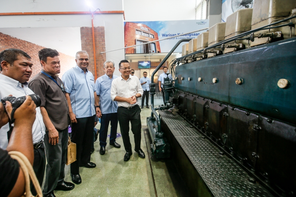 Narendran (third from left) with then minister Nik Nazmi Nik Ahmad (fifth from left during a working visit at the Pantai STP in 2023.
