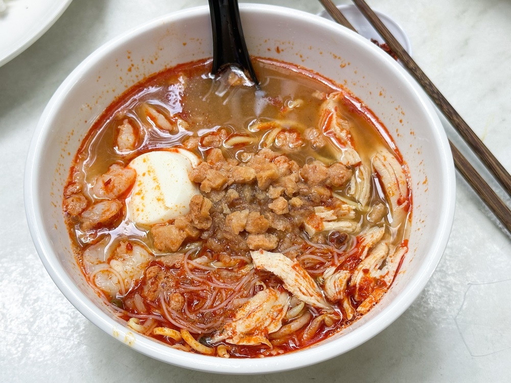 Penang Prawn Mee is the best seller here for its rich crustacean flavour minus the pork and that unique fried tofu topping. — Picture by Lee Khang Yi