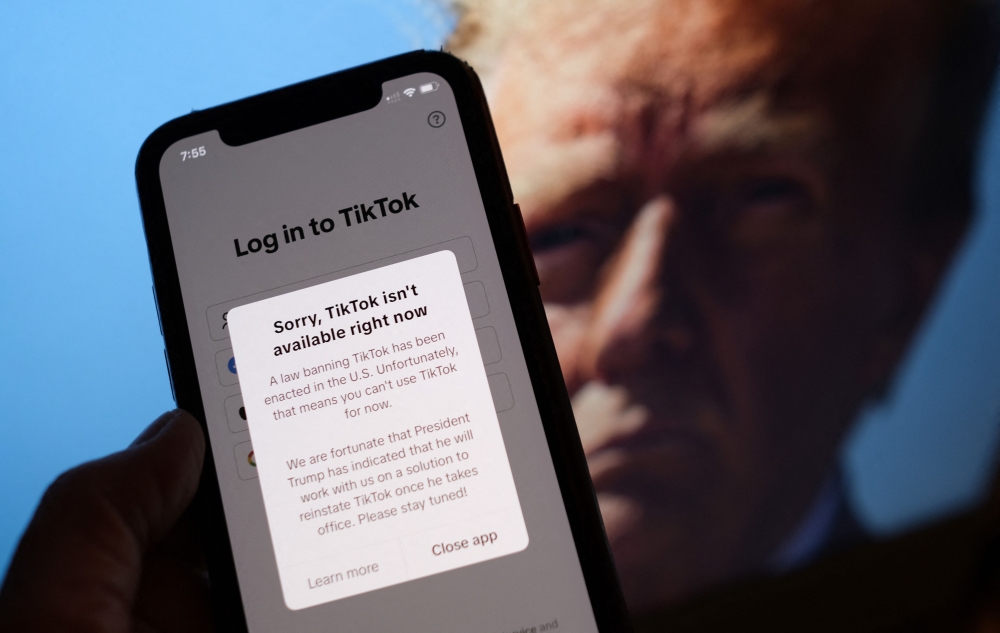 TikTok has restored service in the United States yesterday after briefly going dark. — Pic by AFP