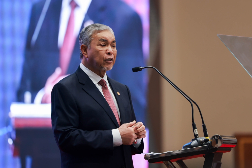Ahmad Zahid also called for establishing a national blockchain-based identity verification system, which is crucial to safeguarding online transactions and mitigating identity fraud. — Picture by Firdaus Latif