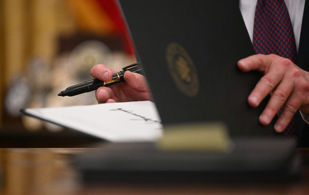 US President Donald Trump promised tariffs and taxes on other countries. — Pic by AFP