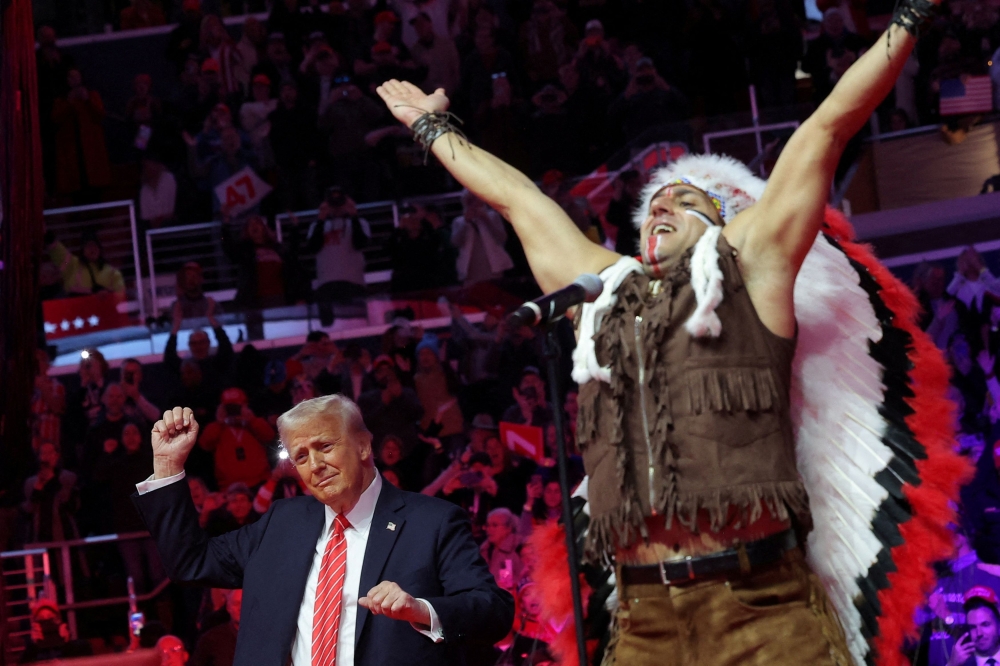 US President-elect Donald Trump dances as the Village People perform during a rally the day before he is scheduled to be inaugurated for a second term, in Washington January 19, 2025. — Reuters pic  