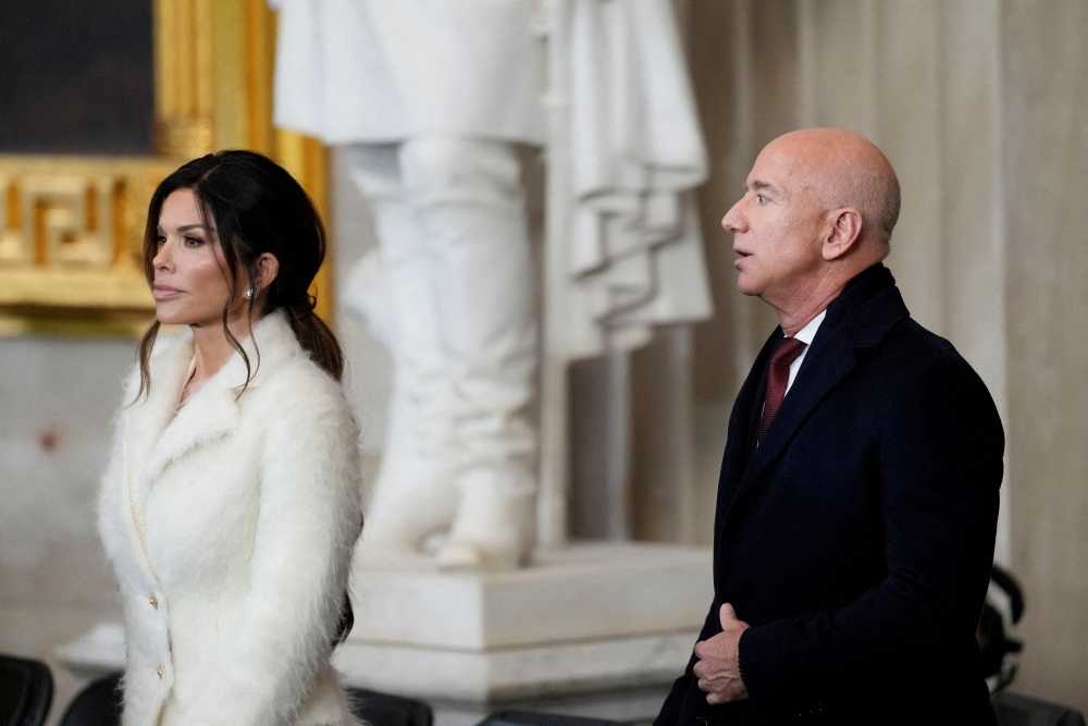 Jeff Bezos and Lauren Sanchez during the 60th Presidential Inauguration in the Rotunda of the U.S. Capitol in Washington January 20, 2025. —  Julia Demaree Nikhinson/Pool pic via Reuters